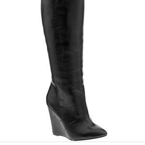 Knee high black leather boots